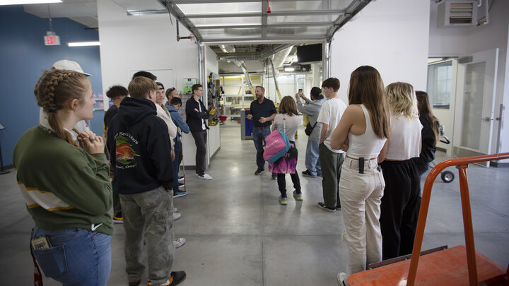 Jerry Reif (center) speaks with Bay High students outside the woodshop in Nebraska innovation Studio Oct. 20, 2022.