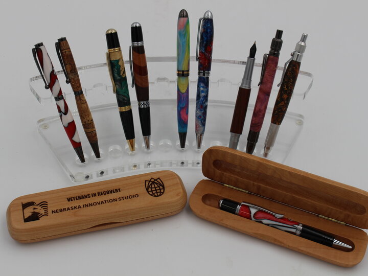 Woodturned pens and laser engraved pen cases